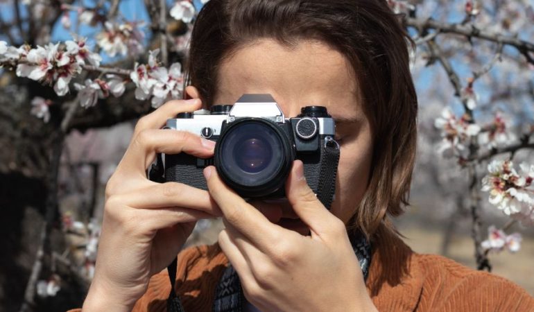 Lady taking pictures